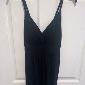 Long black maxi dress with tie back. Fitted dress, long to the floor